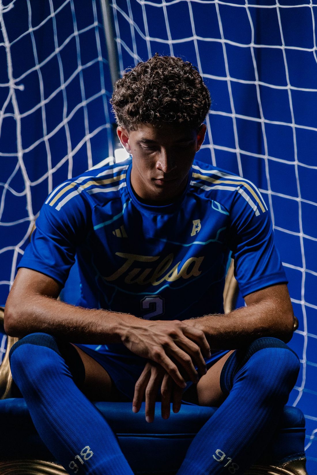 Christian Mezas in a Tulsa Golden Hurricane soccer jersey, number 2